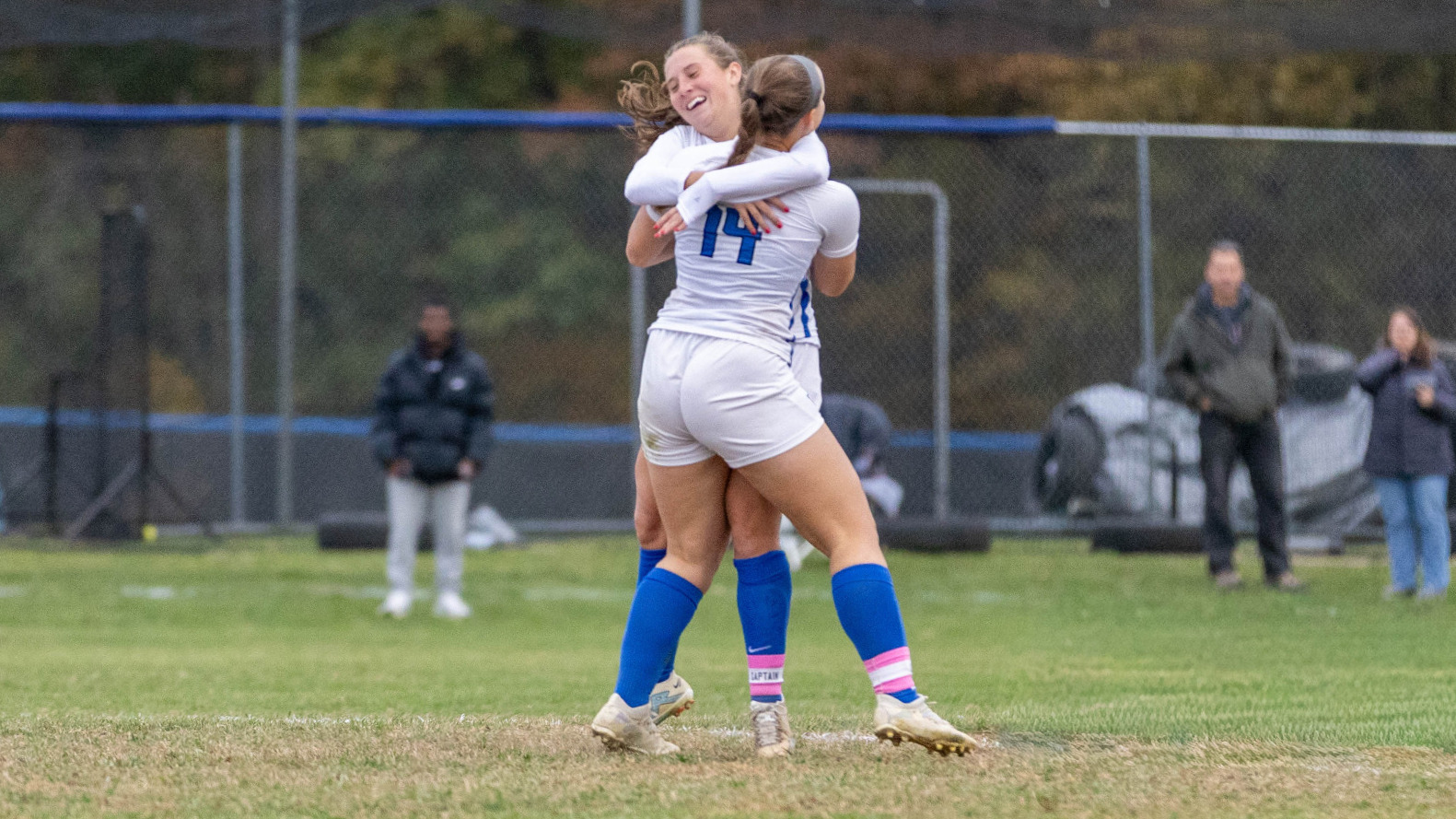Halley Shaffer and Gretchen Turner embrace in a hug after Shaffer scored the game winning goal in double-overtime against Cairn.