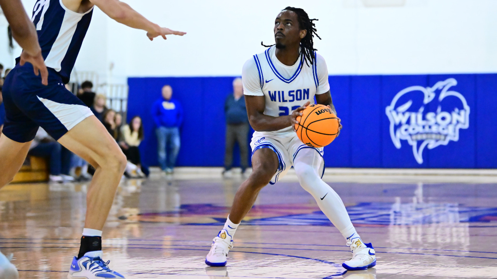 Armani Jones gets ready to shoot a 3-pointer.