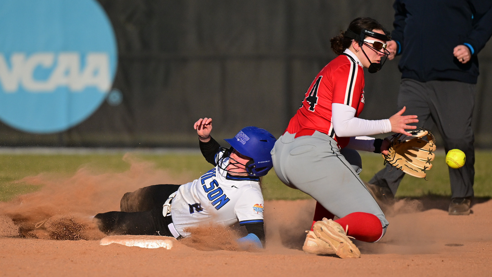 Emily Randalls slides into second base safely