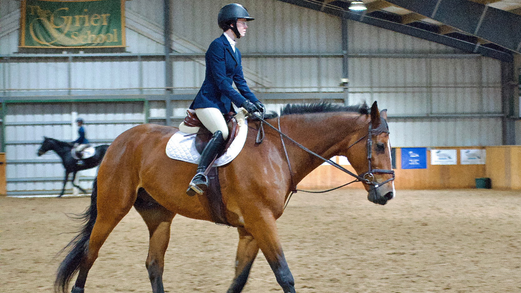 Emily Breighner rides during the IHSA show.
