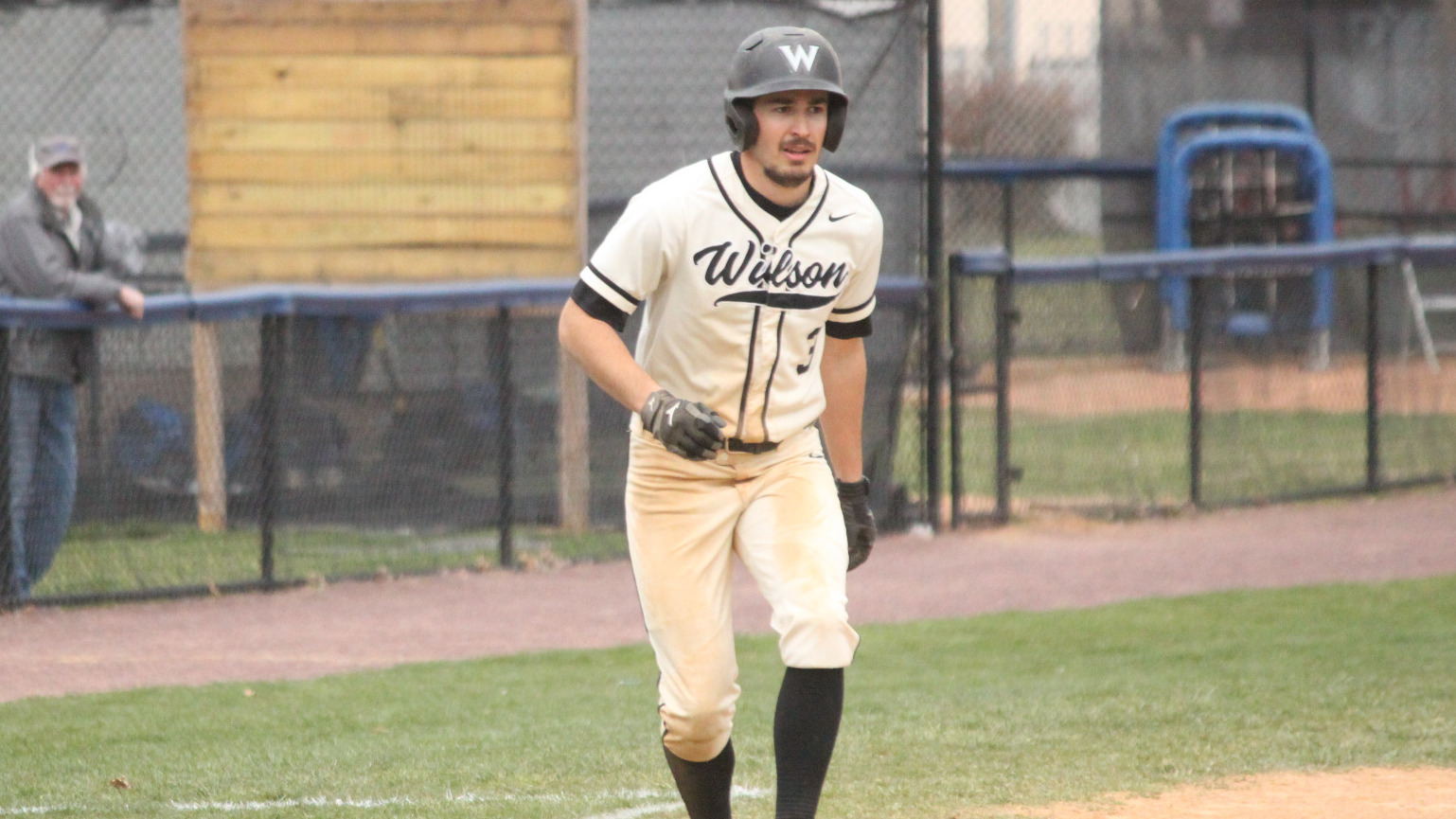 Samuel Martin takes a lead on third base while looking at the pitcher
