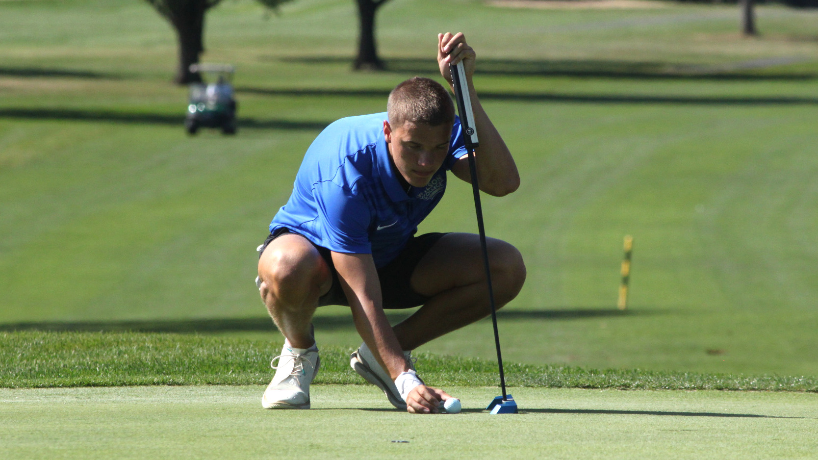 Cole Cooper lines up his put.