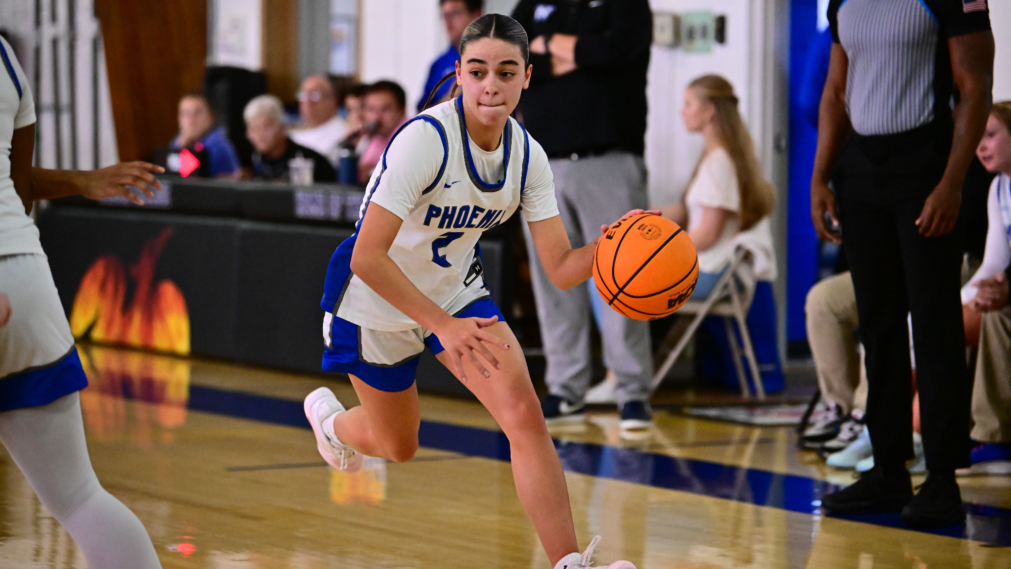 Jewels Torres dribbles down the lane