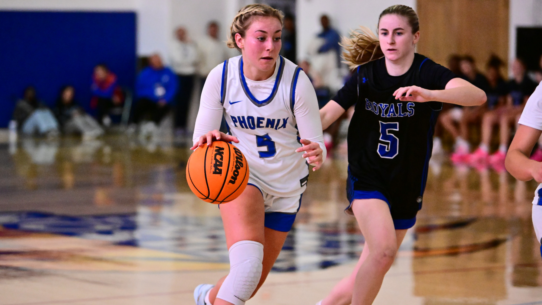 Leah Laubach dribbled down the lane by a defender