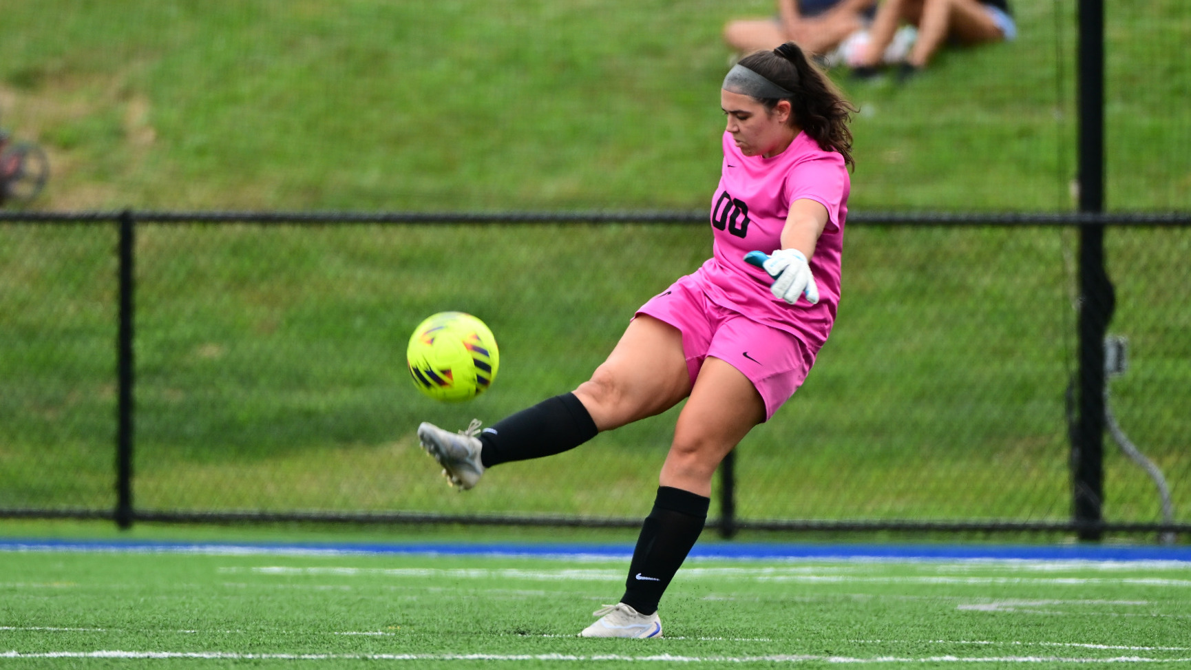 Bella Scarlato kicks the ball