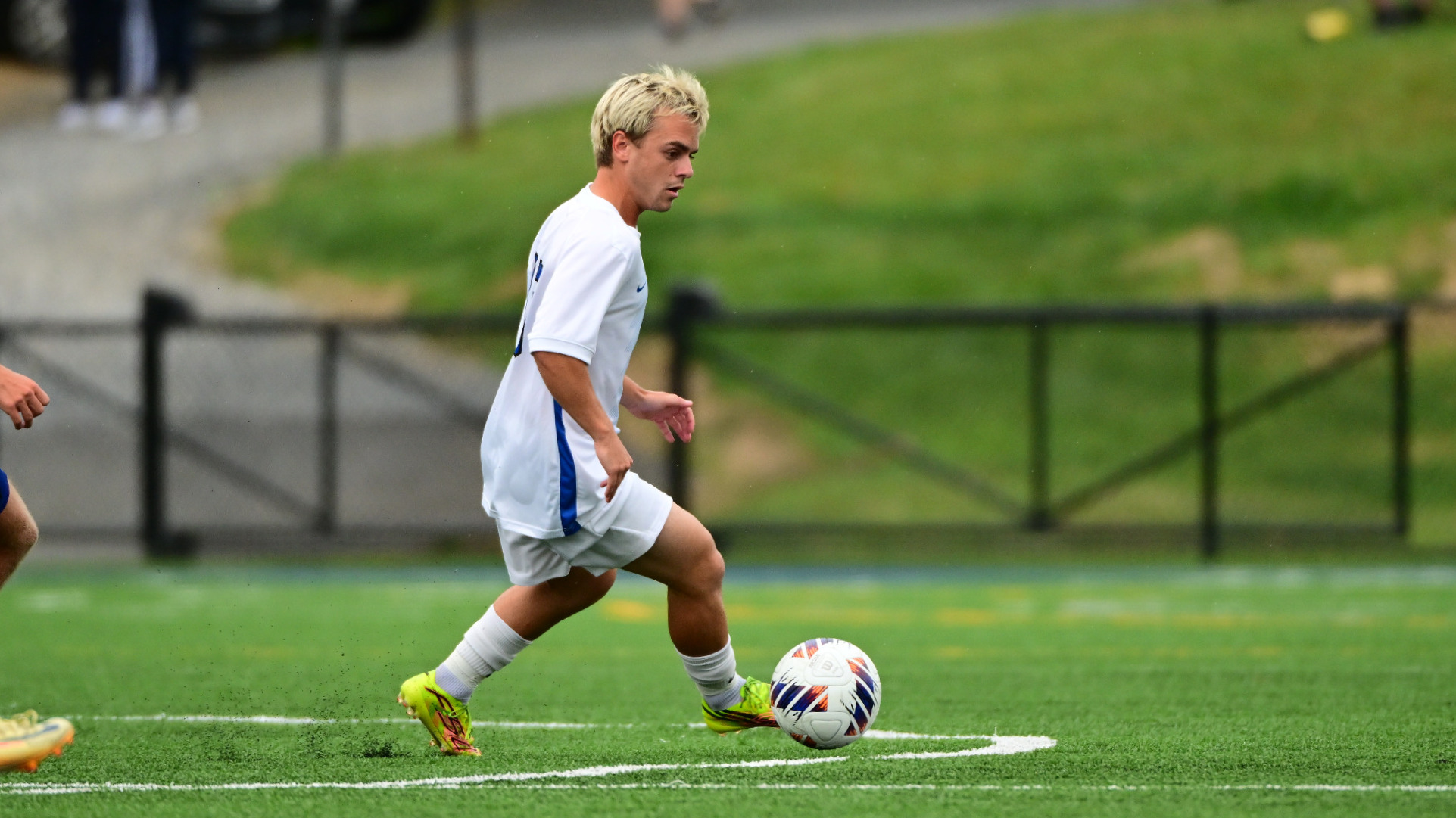 Eric Arbogast dribbles the soccer ball
