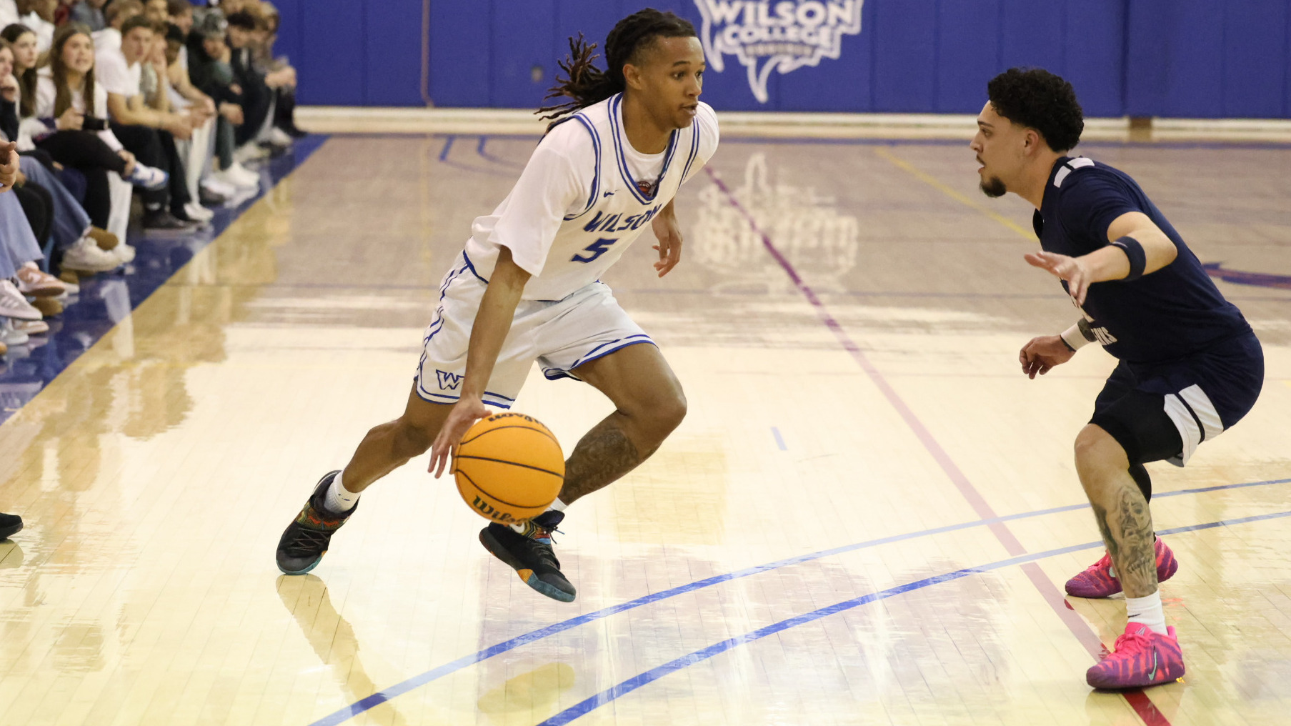 Jalen Bowie drives in on a defender