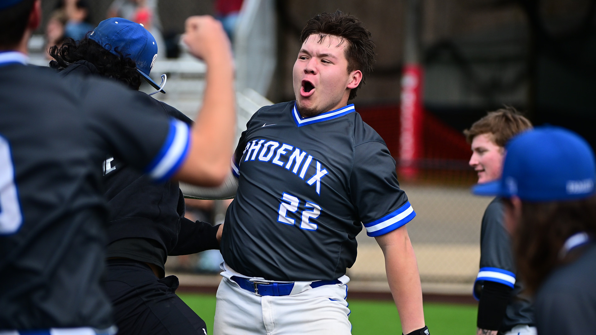Derek Chavera jumps up after crossing home plate following his grand slam.