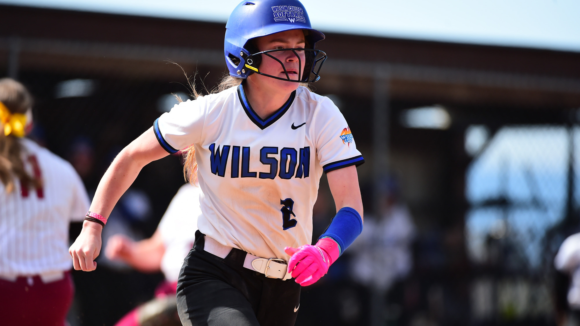 Emily Randalls runs to first