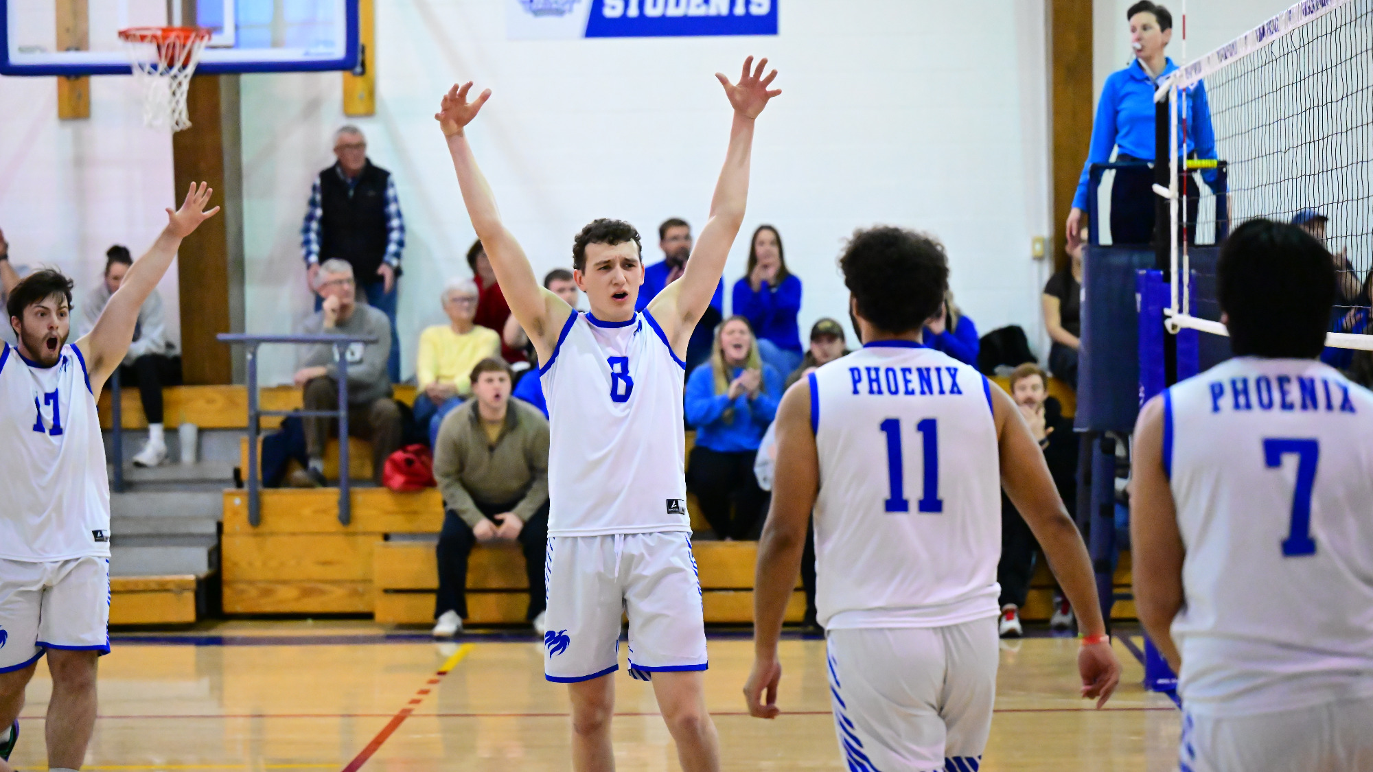 Ryan Koontz celebrates after a point as Demetrius Simmons looks on.