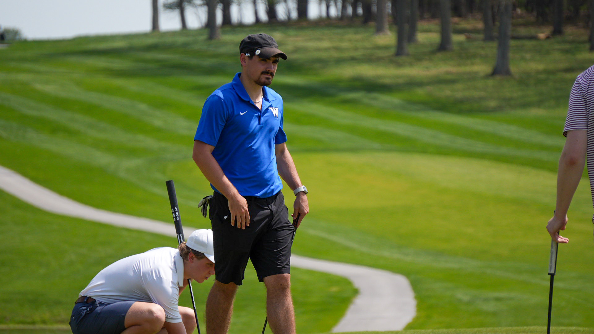 Bryson Curtis walks after putting