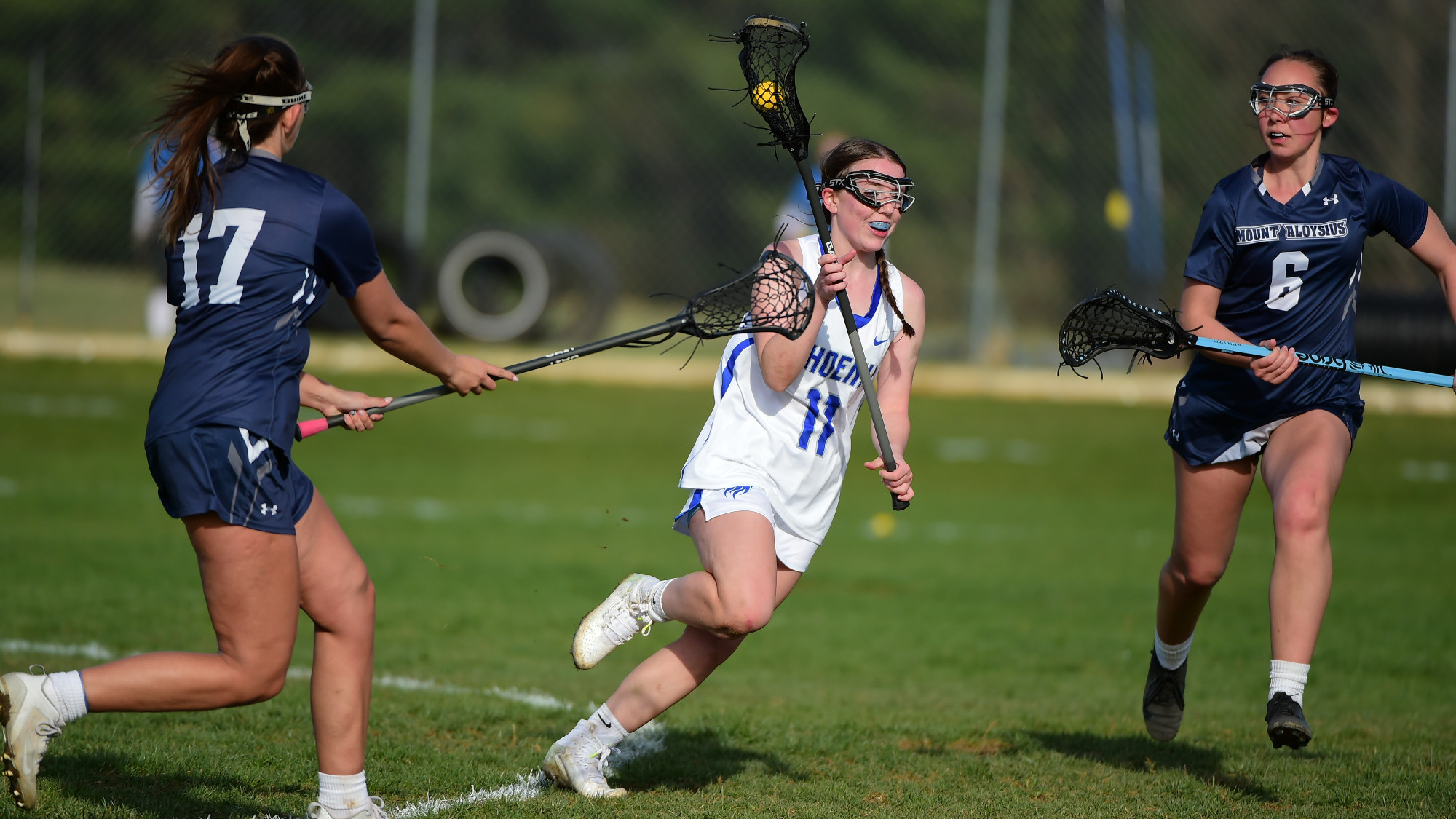 Riley Lemay runs up the field with possession
