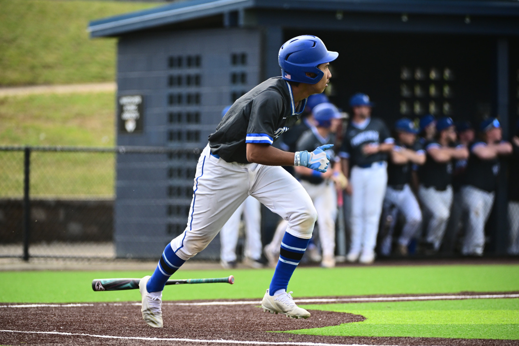 Garrett Drish runs to first