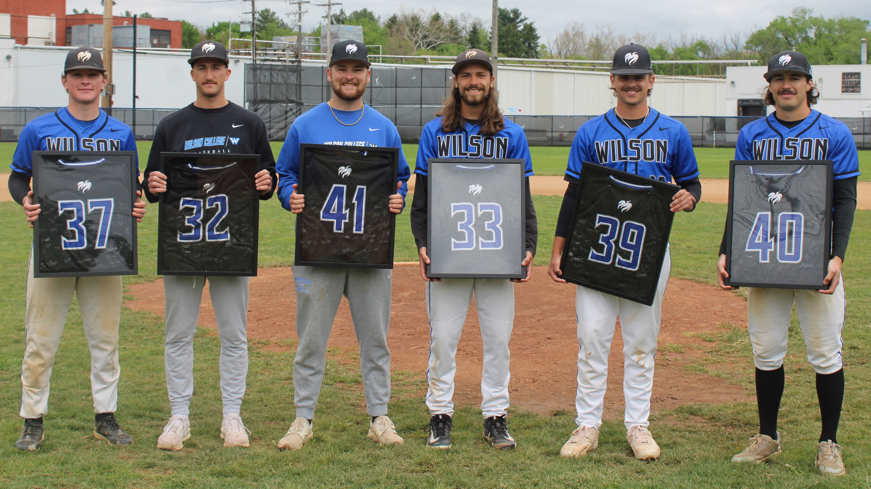 Senior Baseball Players Pose for a Picture after Senior Day Festivities