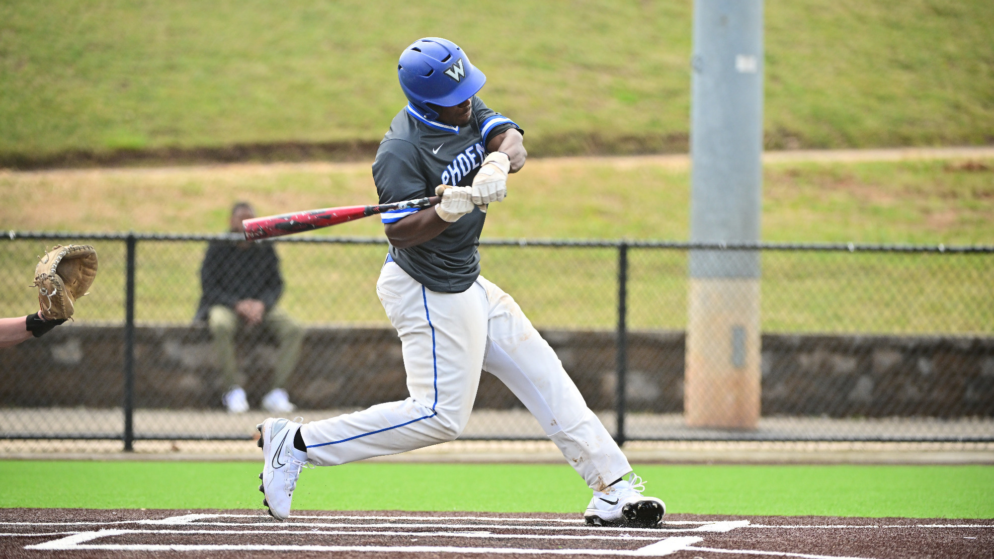 Jermane Miller swings at a pitch
