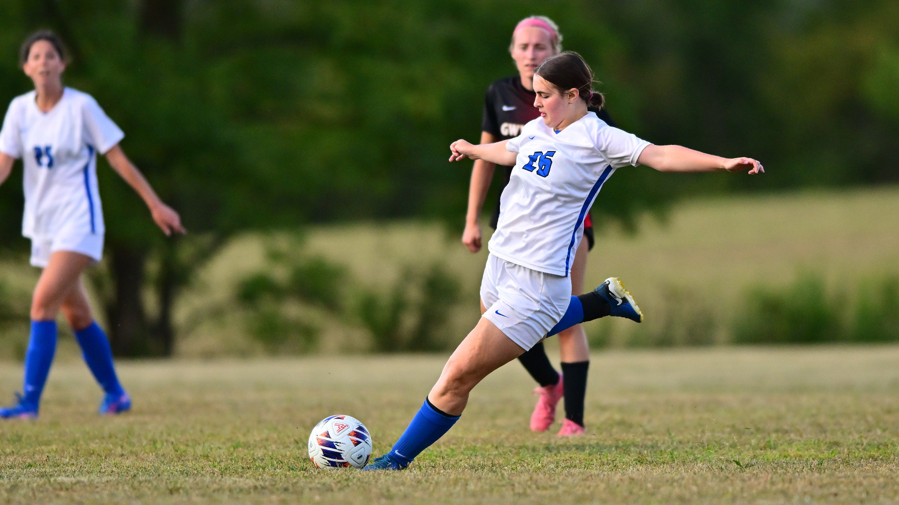 Karen Cutler kicks the ball