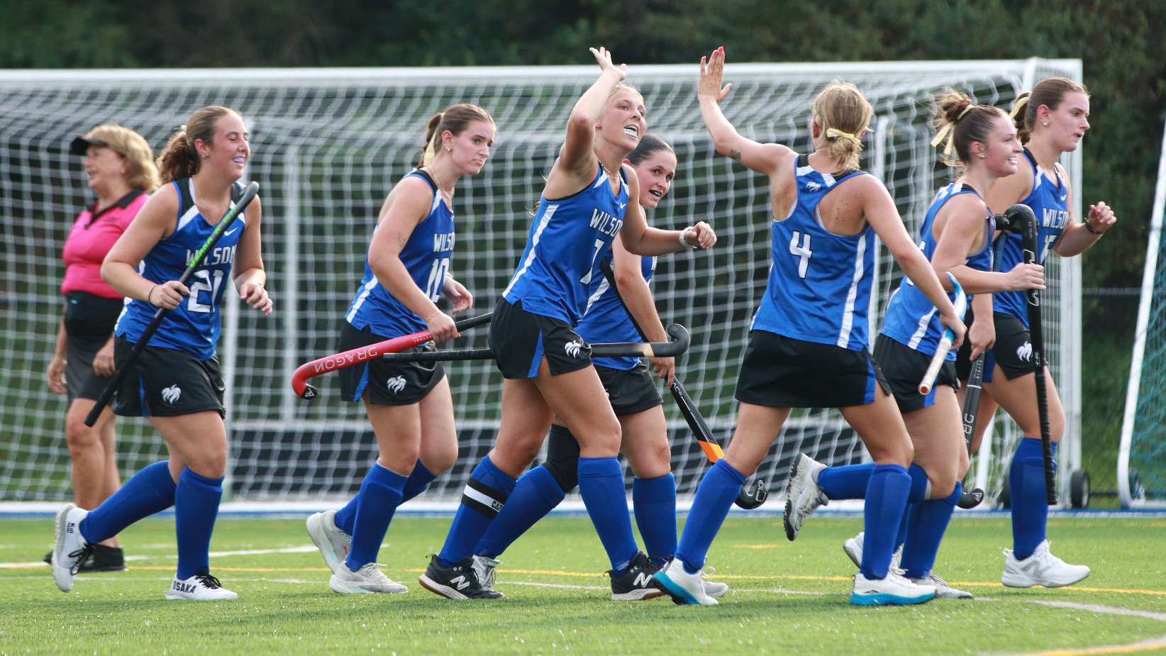 Kate Seymour gets a high five from Ginnah Kendall