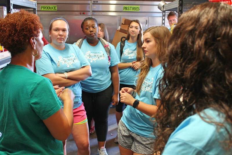 WU W'Engage students volunteer with Love in Action