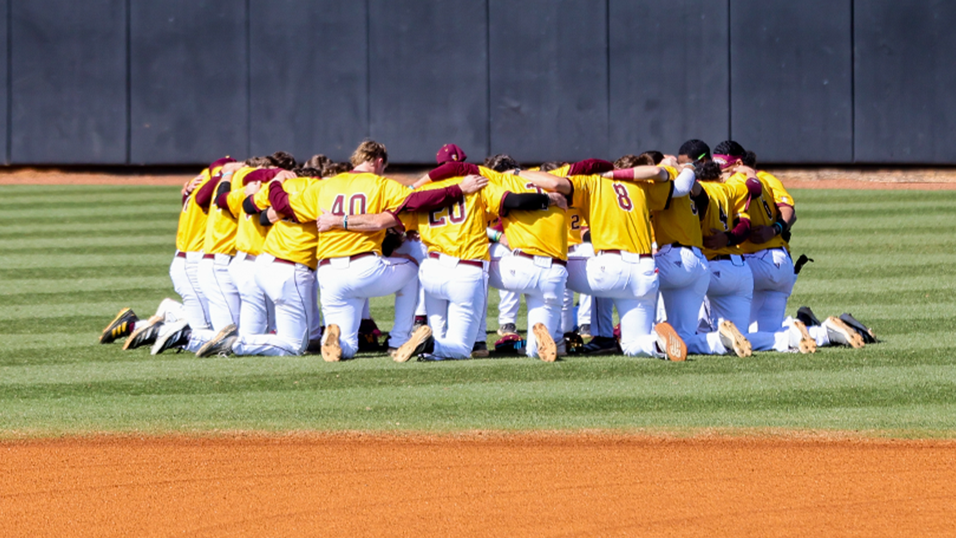 Baseball team huddle