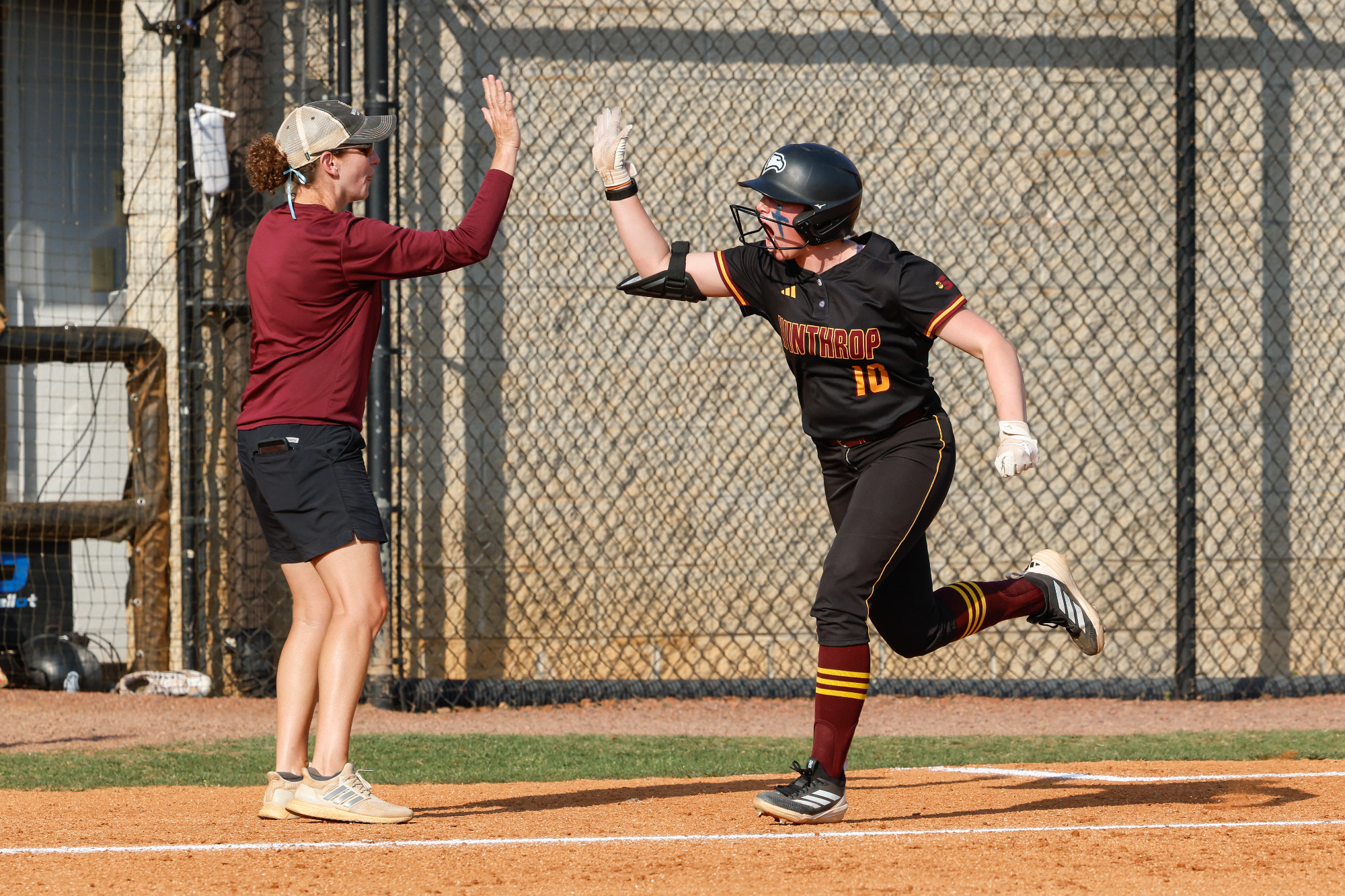 Tabitha Perry Home Run High Five With Coach Kendall Fuller