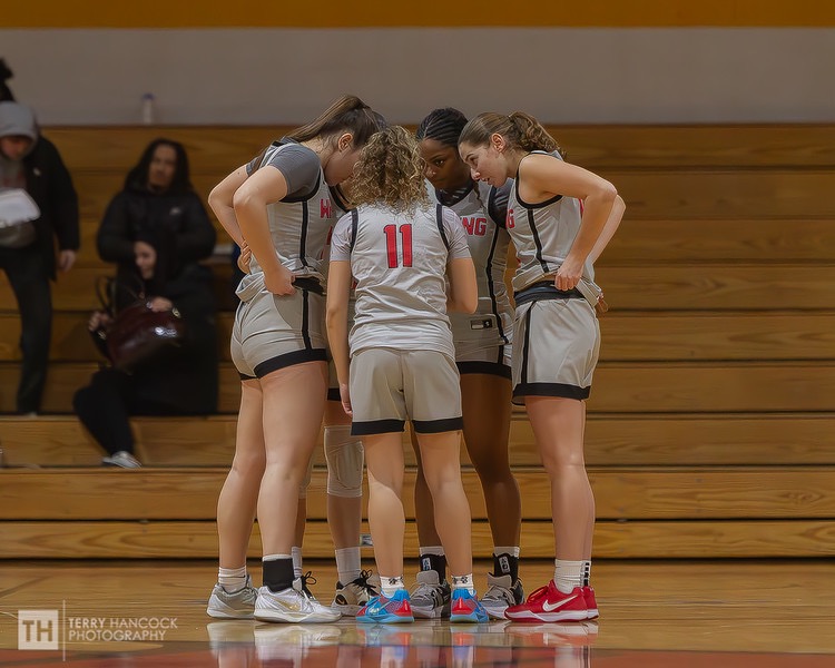 WBB starters huddle