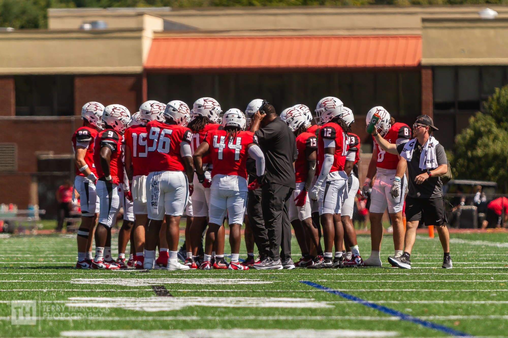 Football Huddle Thomas More