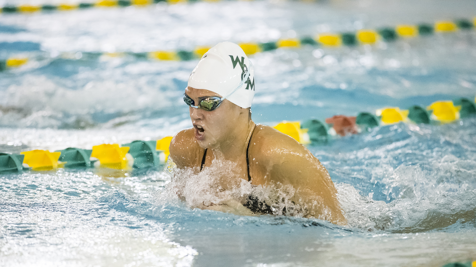 Annie Tuttle swims the breaststroke against Johns Hopkins, Oct. 5, 2019