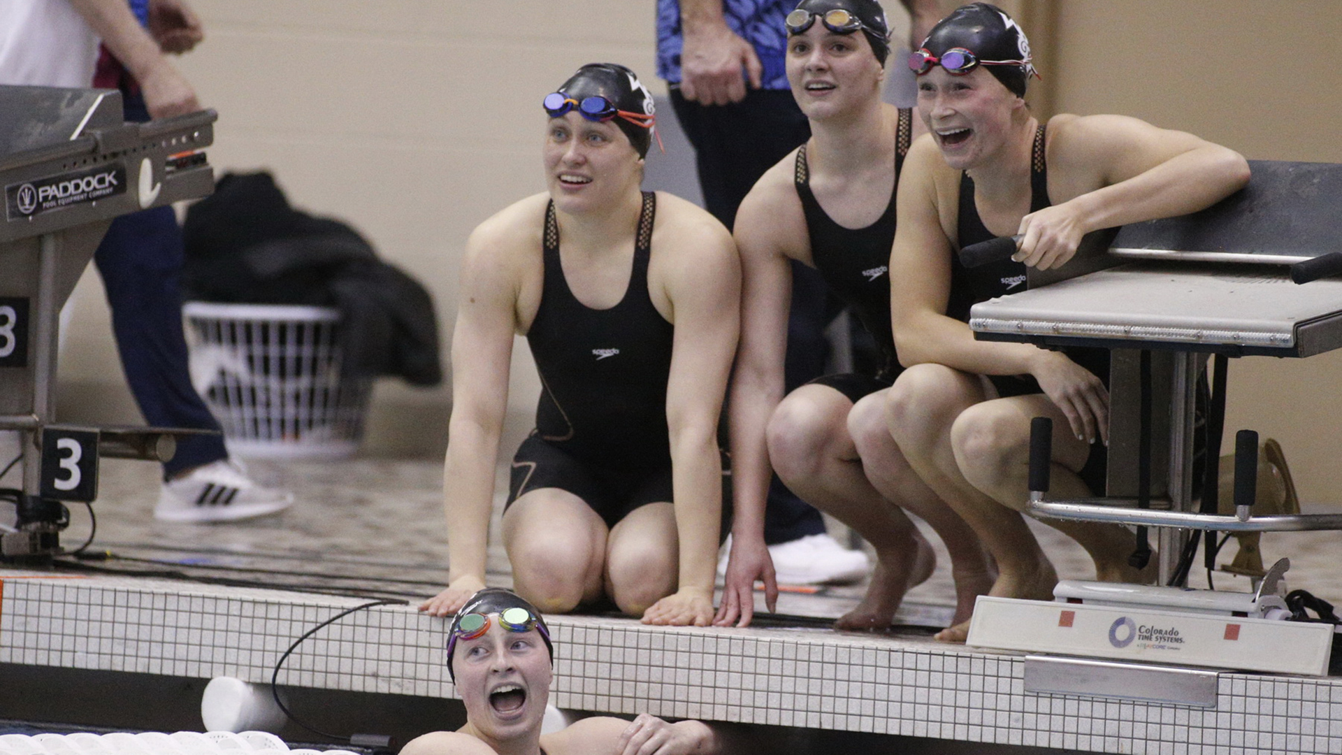Tara Tiernan (below), Megan Bull, Elizabeth Intihar, and Katie Stevenson react after winning the 800 free relay at the CAA Swimming Championships, March 30,2021