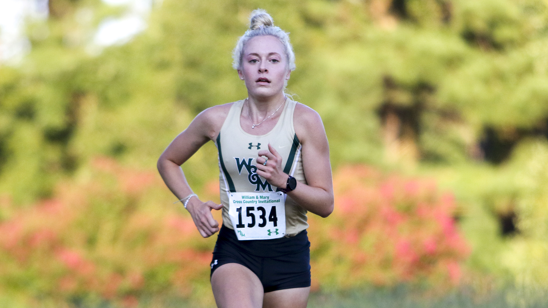 Kyra Holland runs by herself at the W&M Invite. 