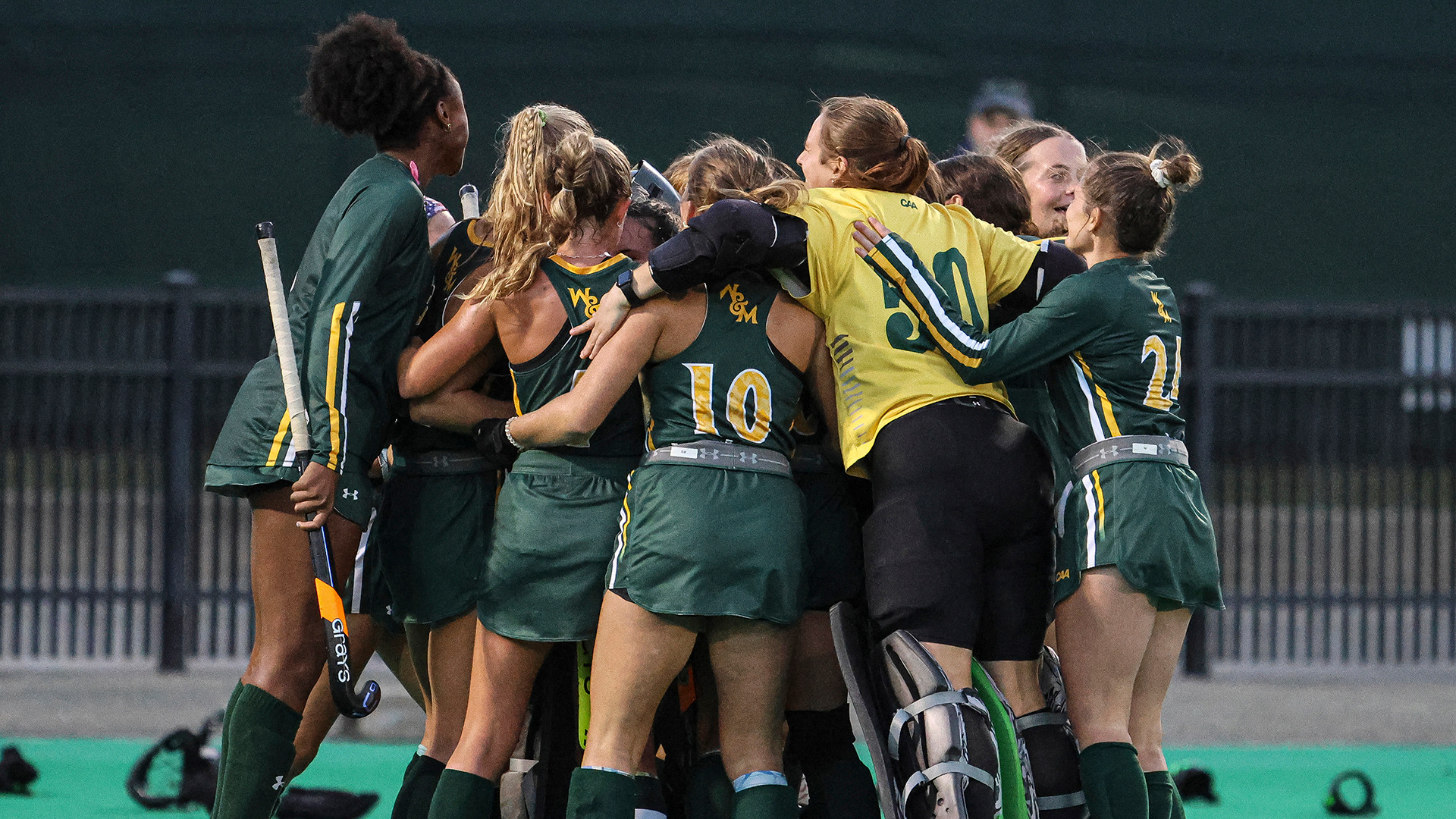 Tribe field hockey huddles up in celebration of the victory over Delaware on Oct. 11. 