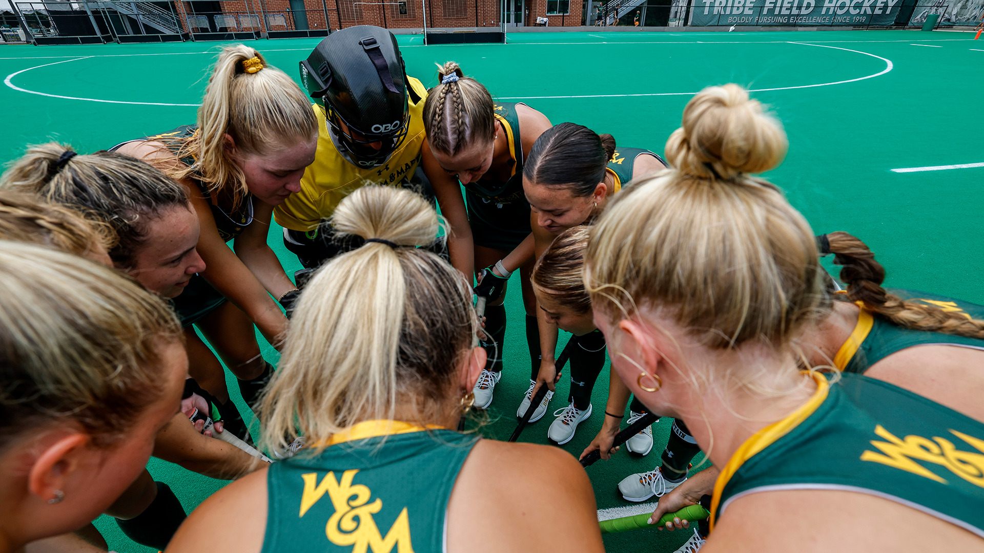 Tribe starters huddle up before the home opener vs. Richmond. 