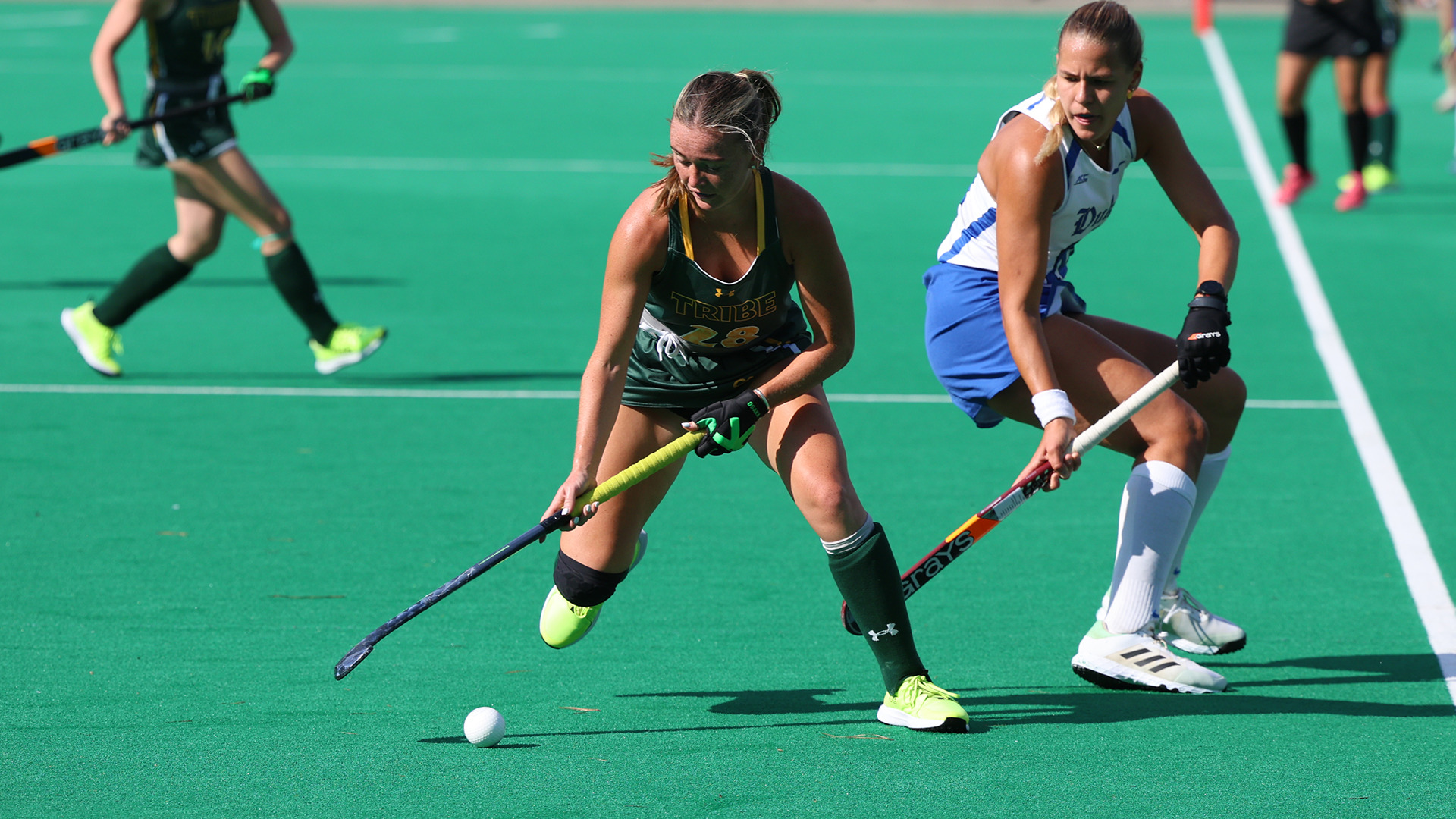 Erin Griffin maintains possession and cuts to the right along the side line vs. Duke. 