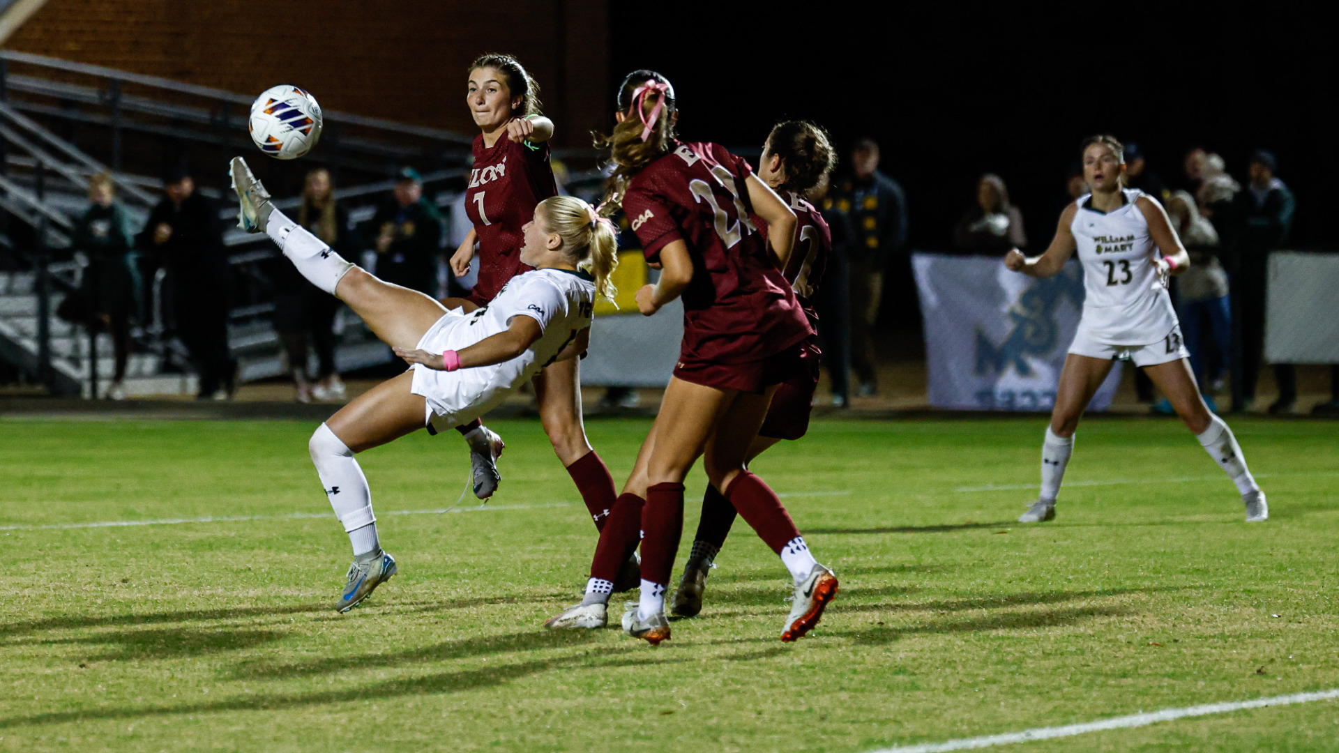 Mia Abbey tries a bicycle kick against Elon