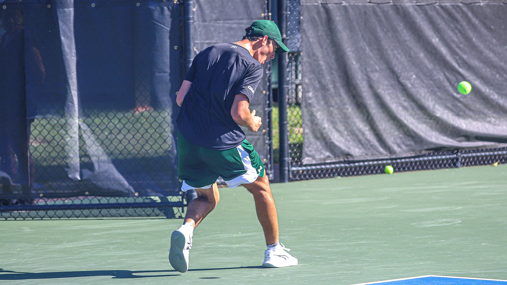 Austin Cohen pumps his fist along the sideline after winning a point at the River City Open. 