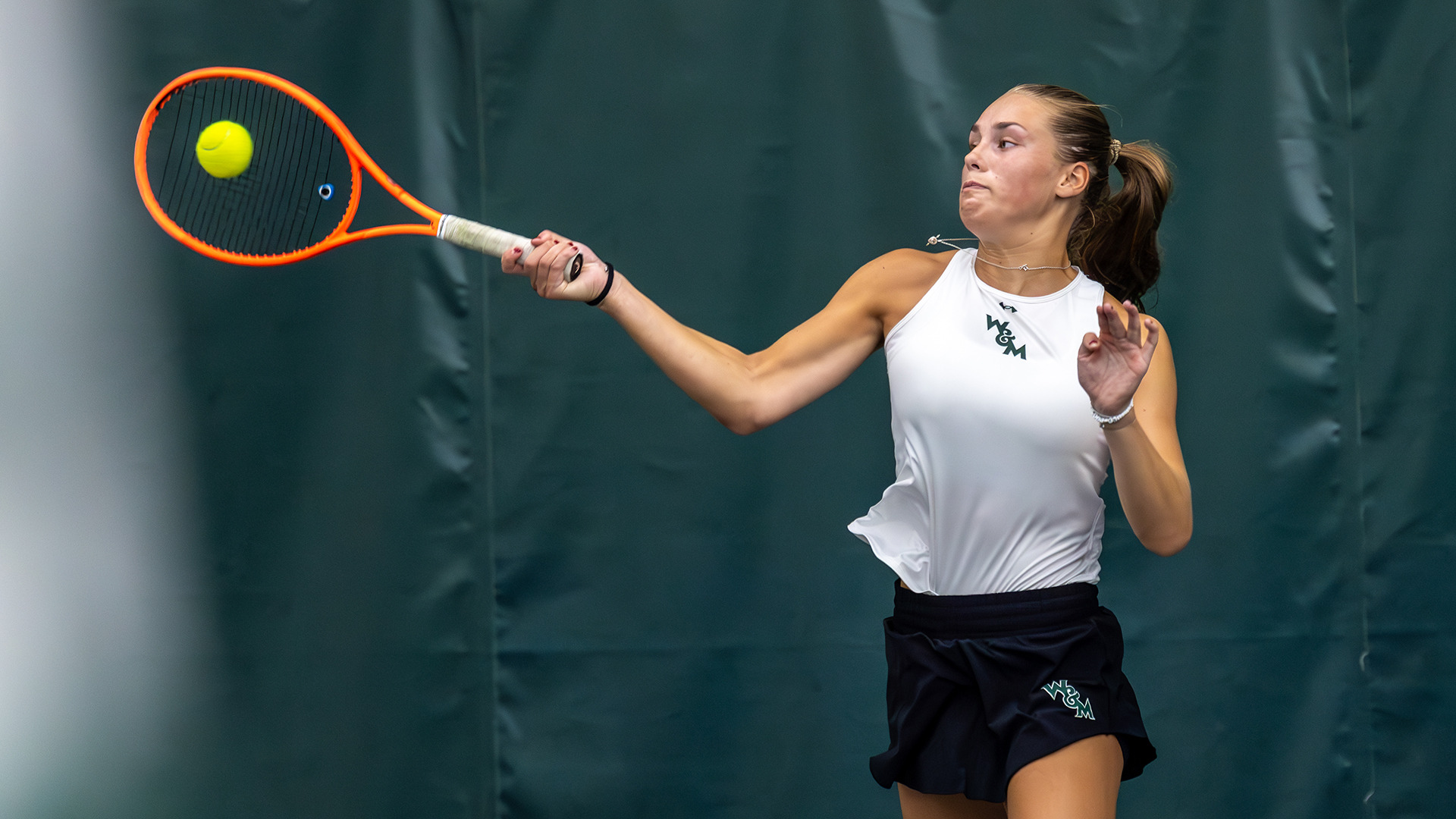 Tilda Larsson hits a forehand at the McCormack-Nagelsen Tennis Center during the Tribe Invitational