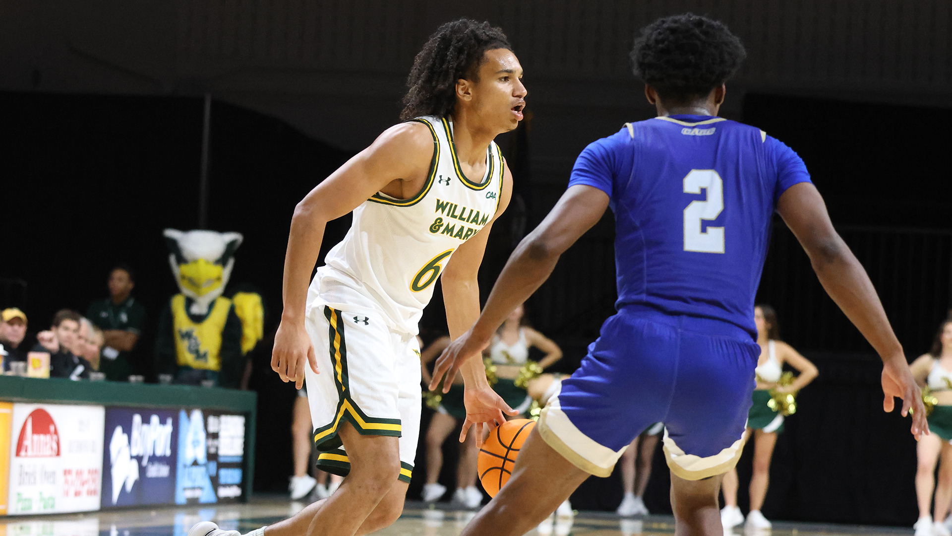 Colin Lamine Ndaw dribbles and looks over the Georgian Court defense in the Tribe's season-opening win. 