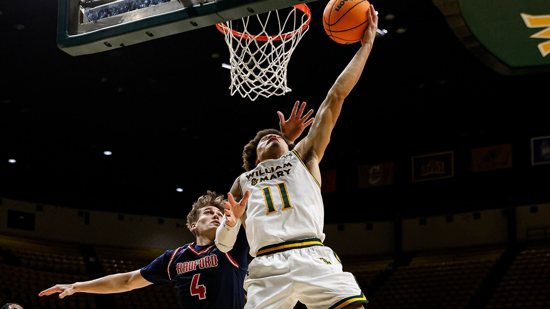 Kyle Pulliam scores two of his season-high 22 points on a cutting lay-up in the win over Radford. 