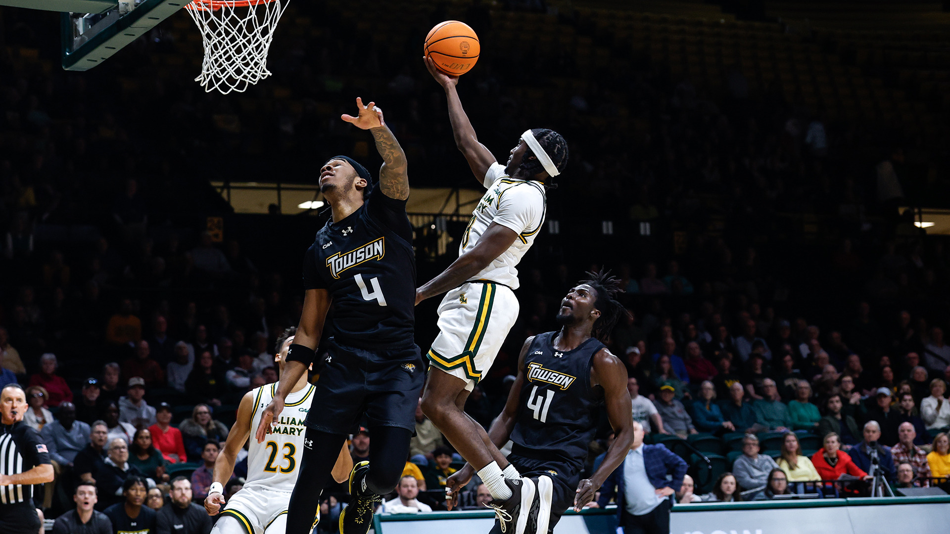 Jhei-R Jones elevates over a Towson player for a lay-up in transition during the Tribe's 84-70 CAA win over Towson on Dec. 29, 2025. 