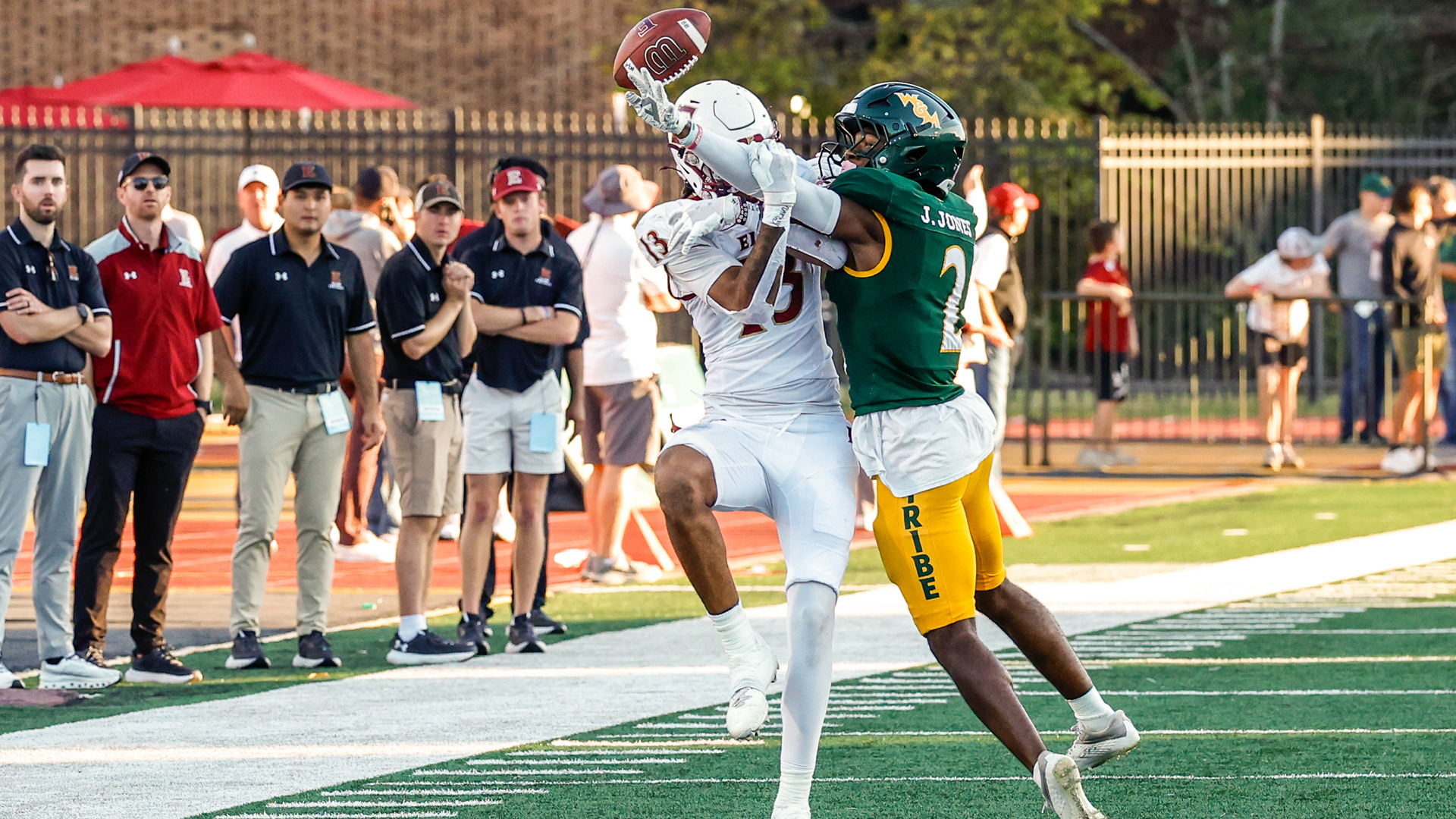 Jalen Jones leaps in the air to break up a pass intented for an Elon wide receiver during a game at Zable Stadium.