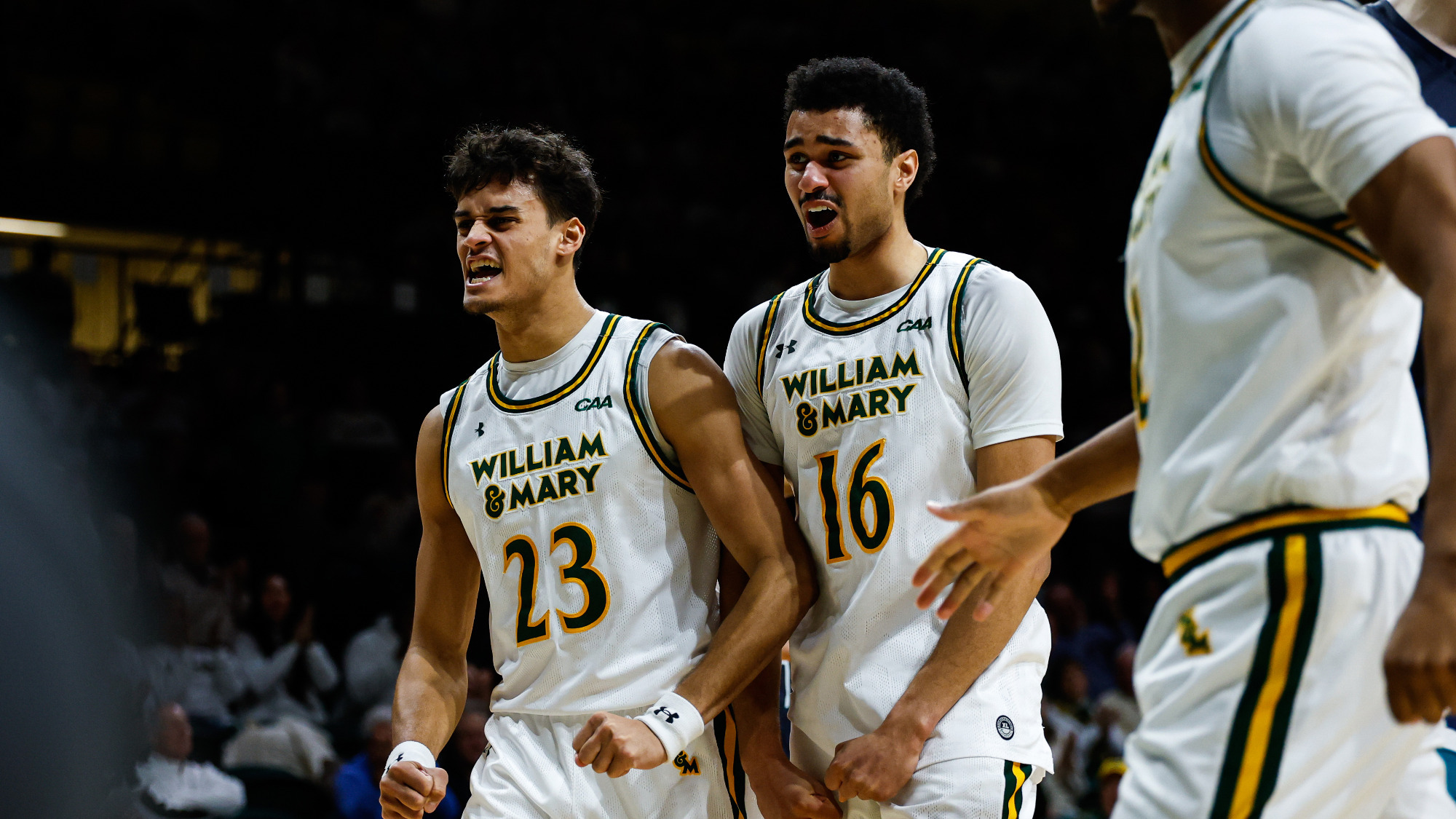 Jo'el Emanuel and Tunde Vahlberg Fasasi celebrate a Kyle Pulliam and-1 in the second half of the Tribe's 77-70 home win over UNCW. 