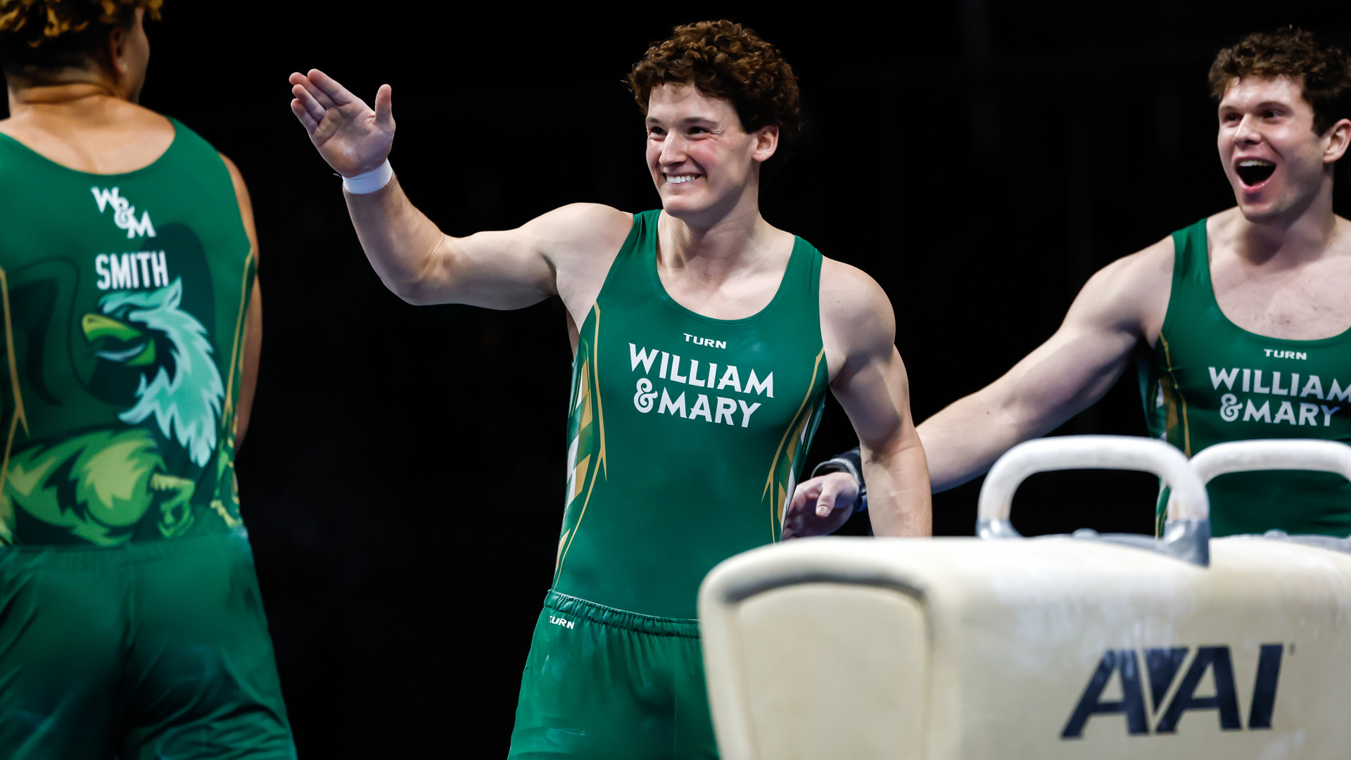 Luke Tully celebrates during a meet at Kaplan Arena
