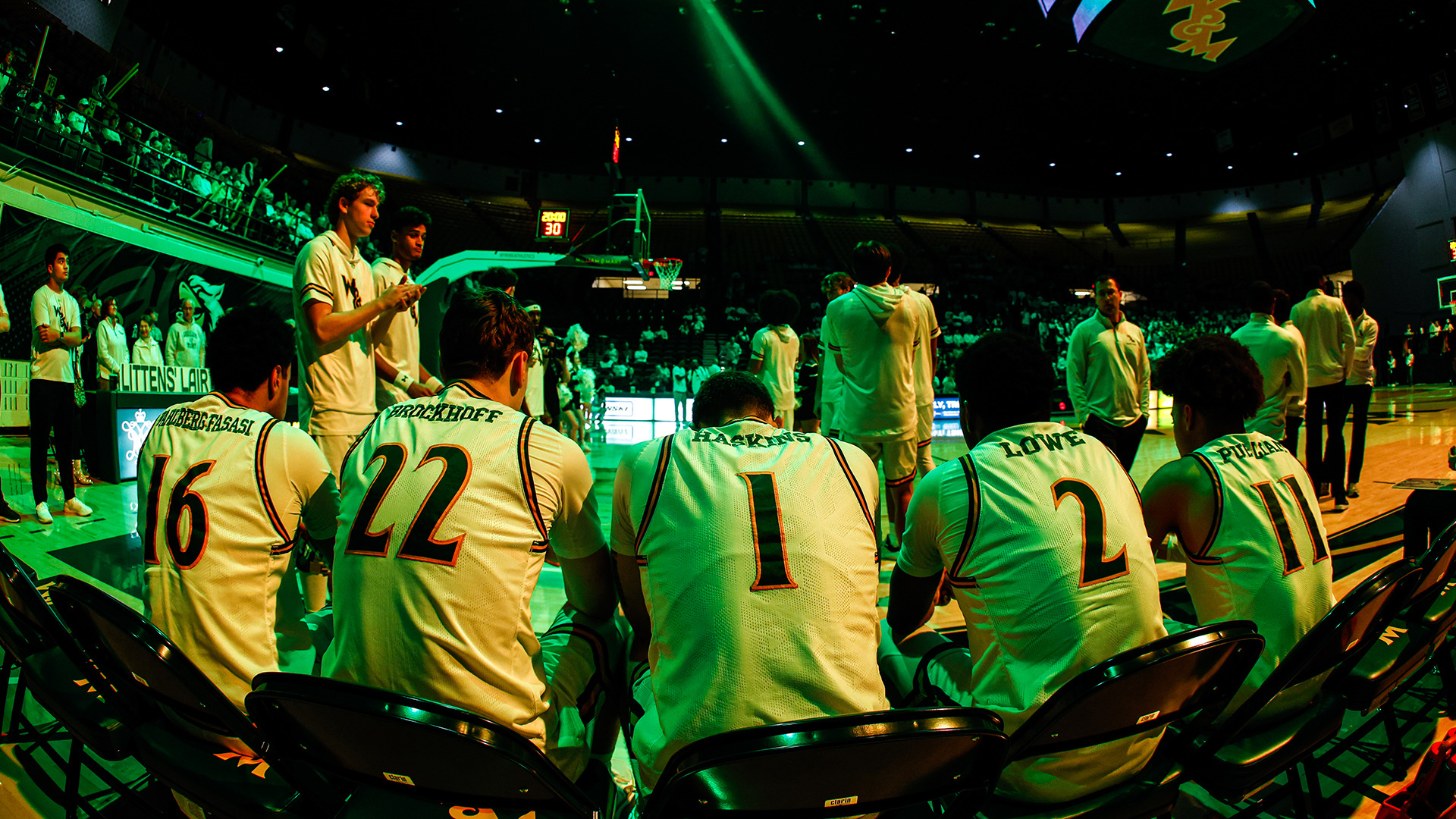 The Tribe starters sit on the bench with a green light on them as team mates clap prior to the introduction of the starting lineup prior to tip-off vs. UNCW.