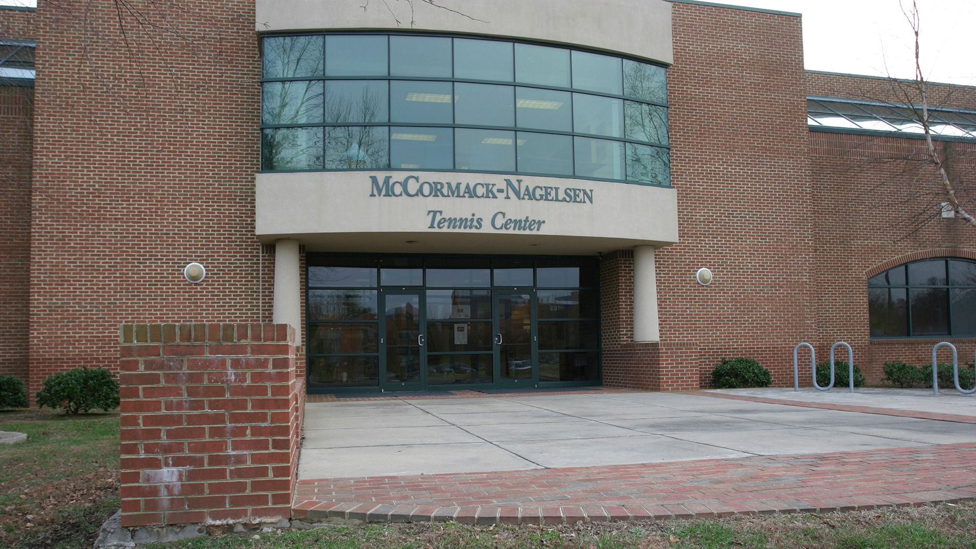 The outside front of the McCormack-Nagelsen Tennis Center. 