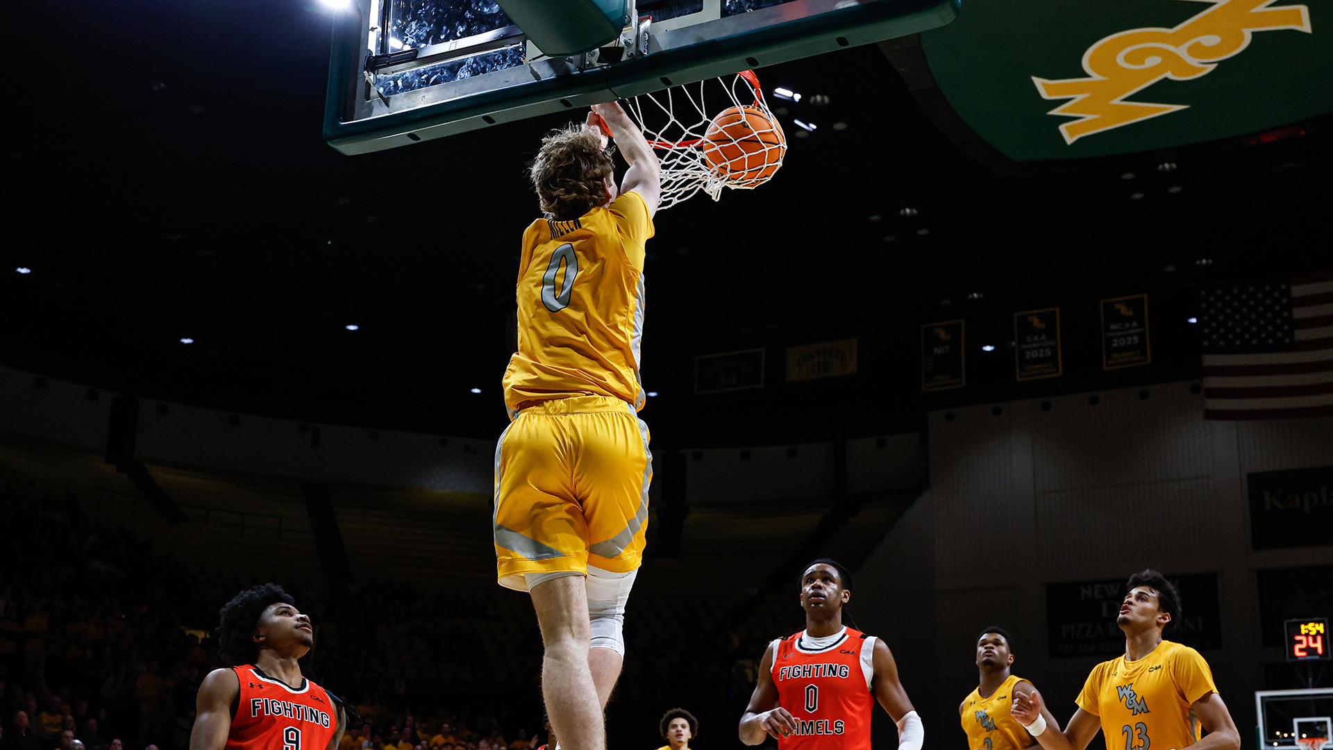 Reese Miller throws down a baseline dunk on Gold Rush against Campbell. 
