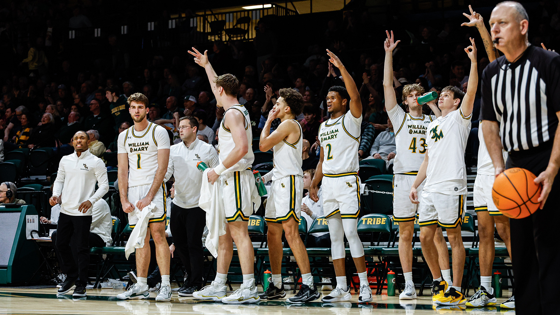The Tribe bench celebrates a big play in the home win over Towson to open CAA play. 