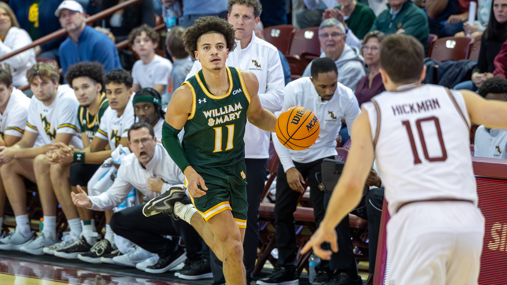 Kyle Pulliam dribbles the ball up court in the opening half at Charleston. 