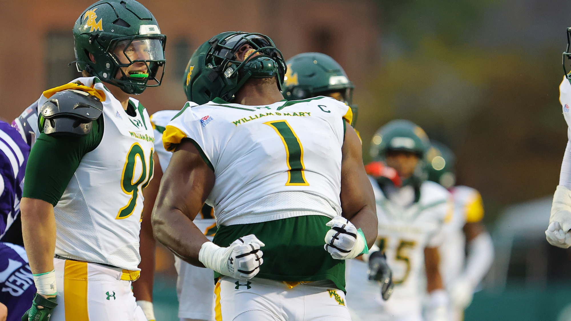 Davin Dzidzienyo celebrates a big play during a game at Zable Stadium