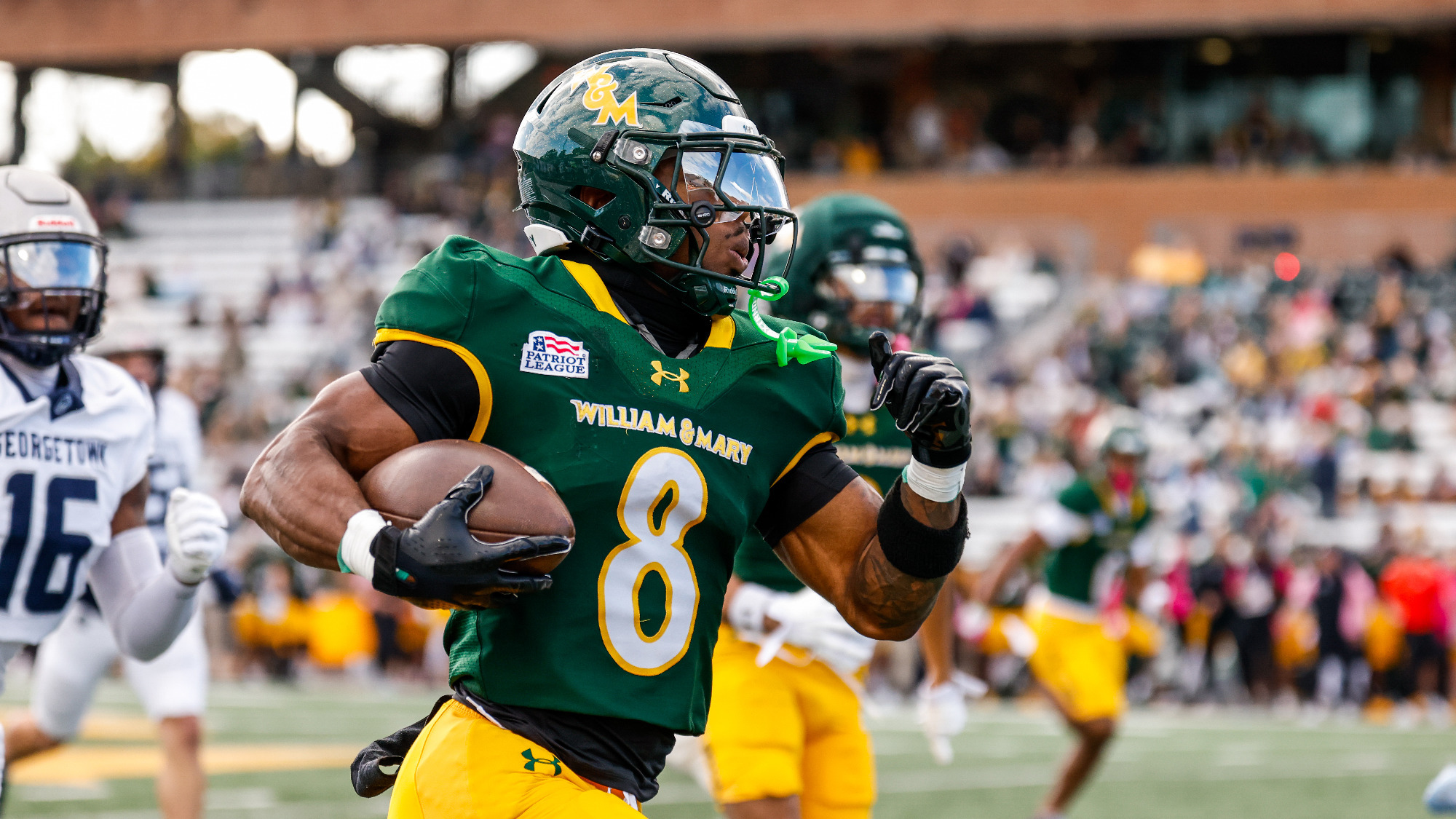 Andrew King runs for a touchdown versus Georgetown at Zable Stadium