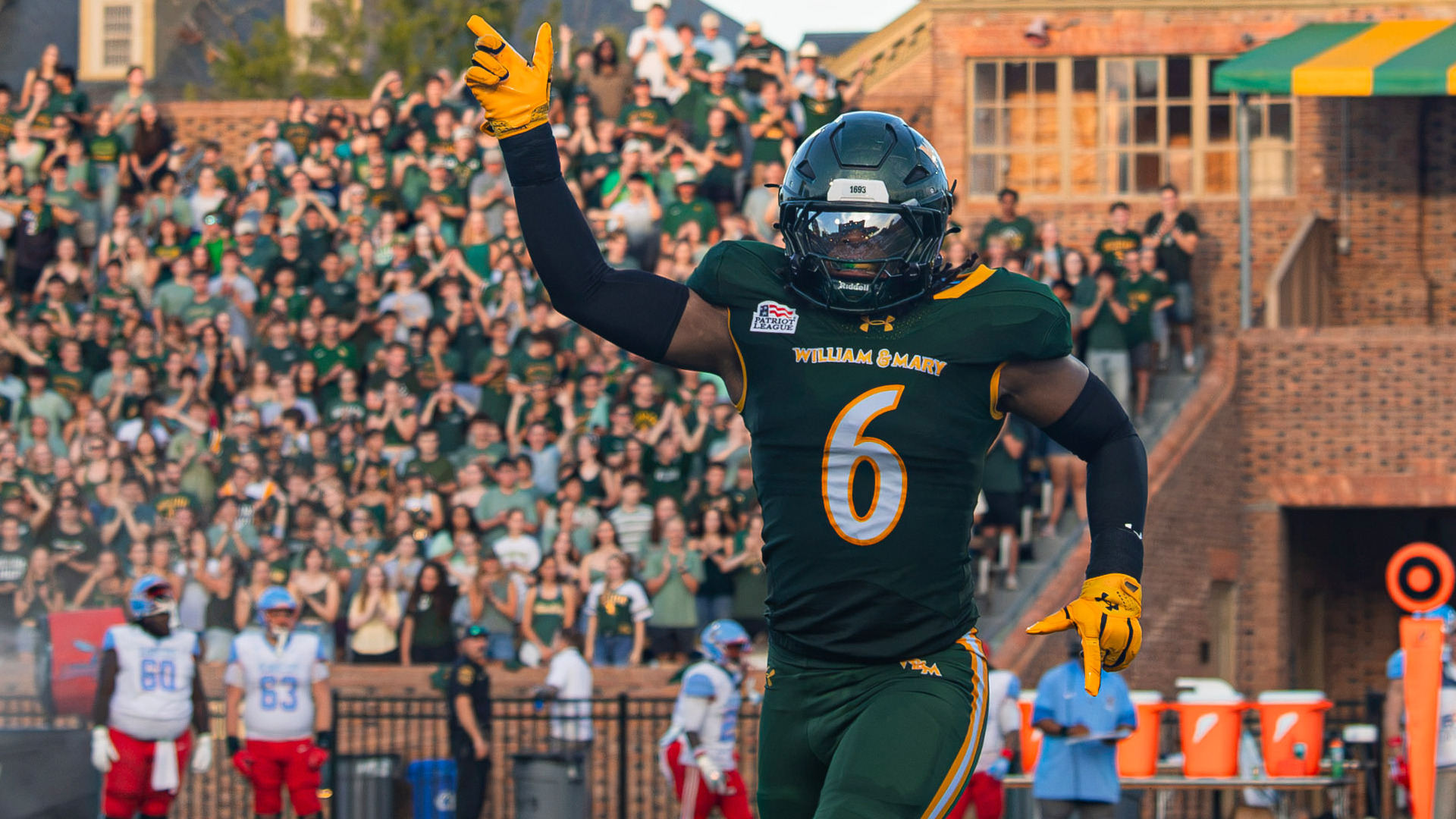 Elijah Rainer celebrates as he comes off the field at Zable Stadium 
