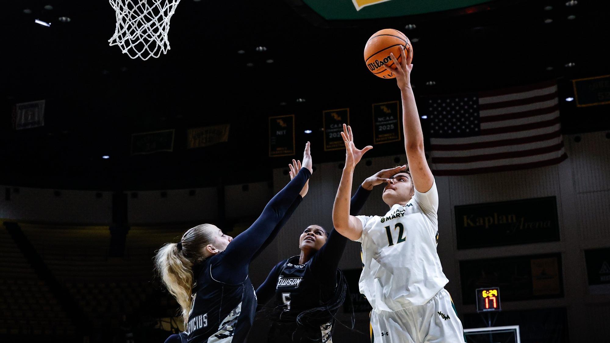Tika Sallman scoring a basket